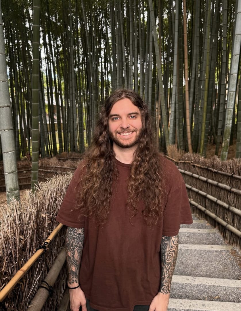 Ravenscoon standing amid bamboo